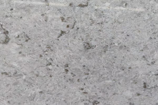 Grey colour with darker grey patches and mirror flecks within the material