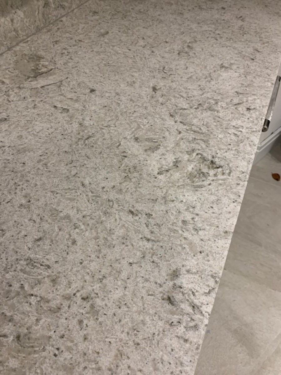 Fugen Borini colour light grey with dark grey pattern running thorugh and small hint of mirror chips installed in Chorley Leyland