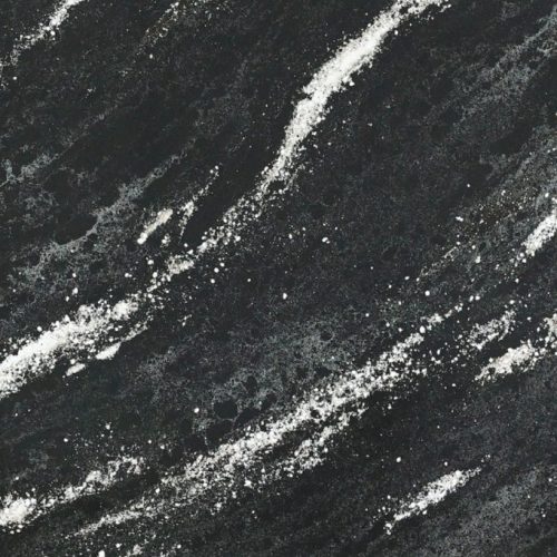 Black background colour with white vein swirls giving it a cosmic look